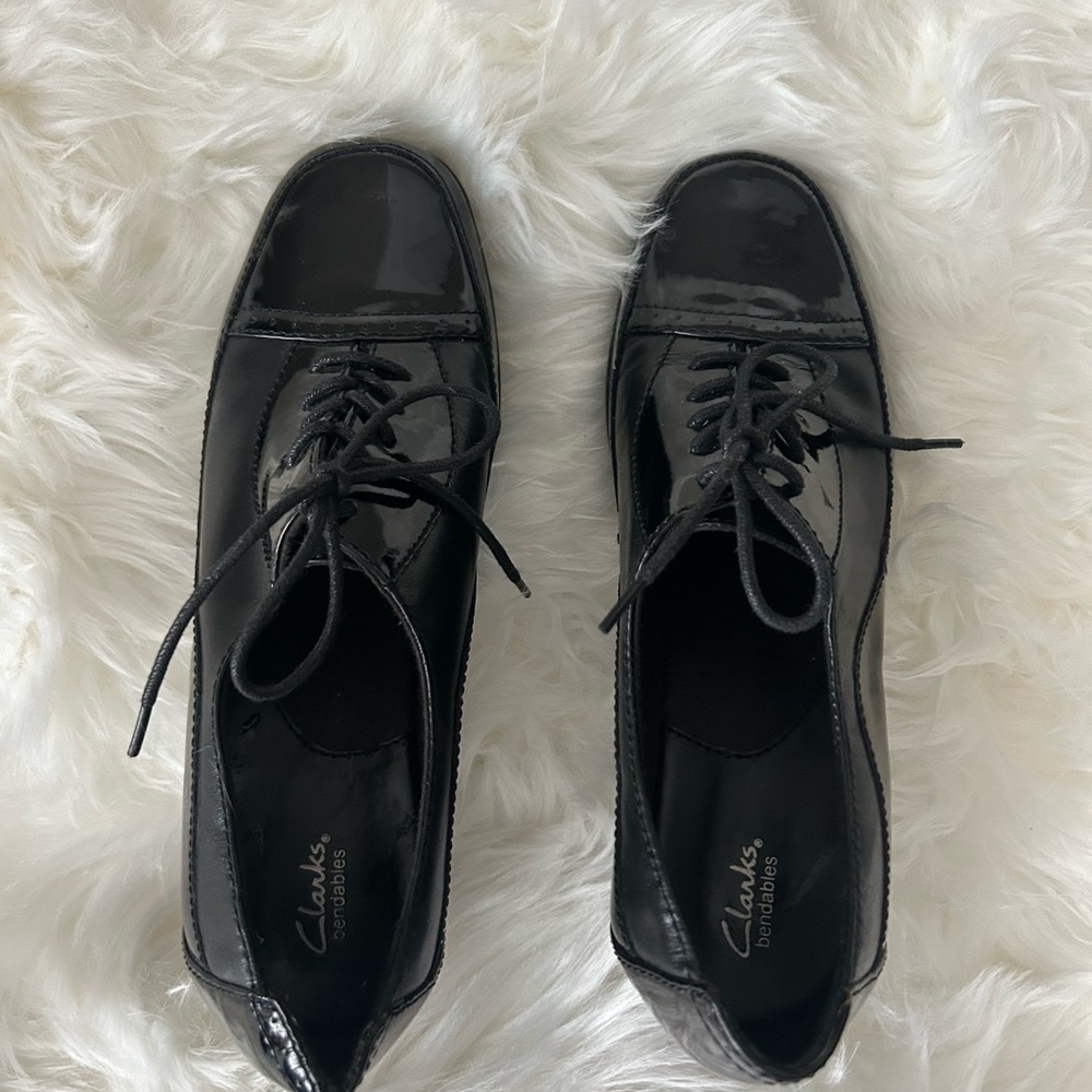 Clarks Women's Glossy Black Lace-Up Flats